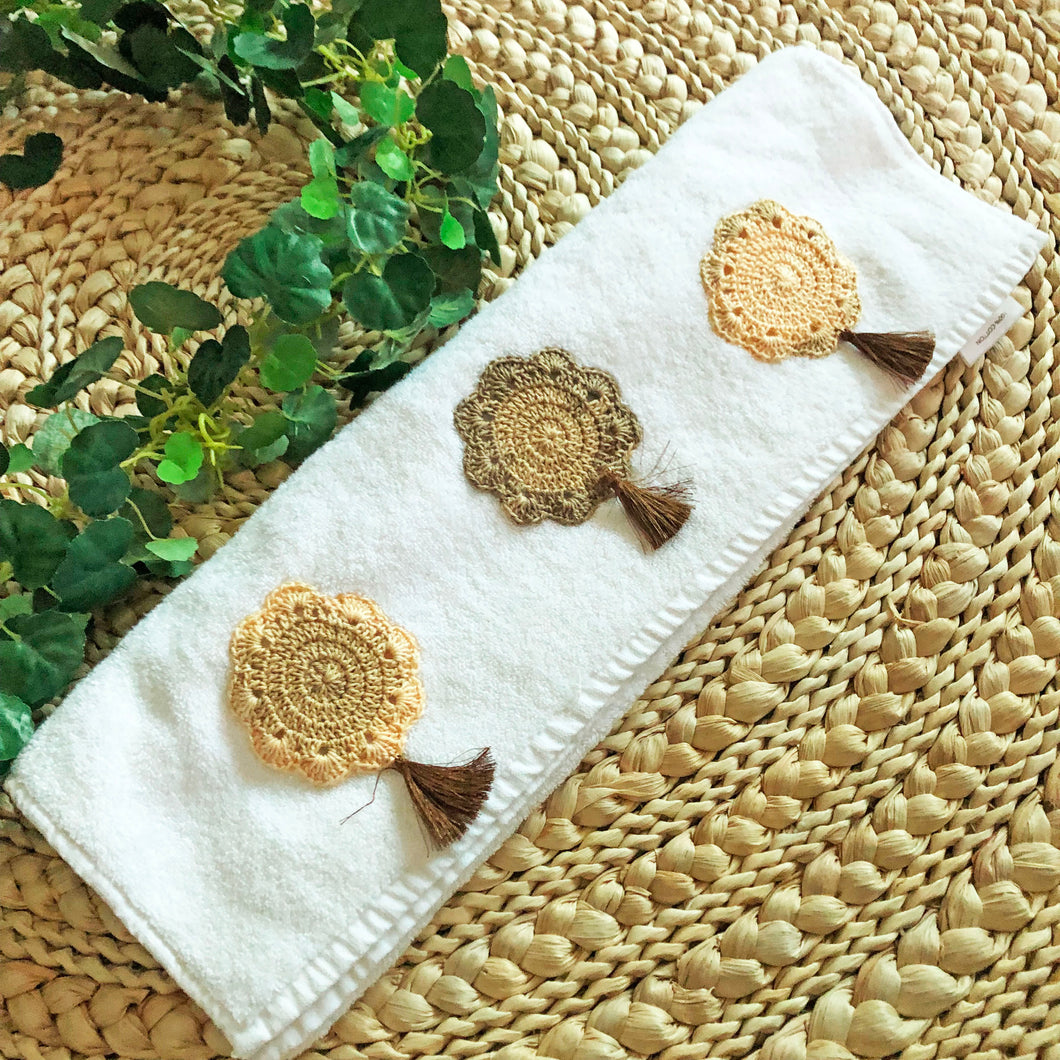 Earthy Elegance: White Towel featuring Handcrafted Crochet Flowers and Tassels in Natural Tones