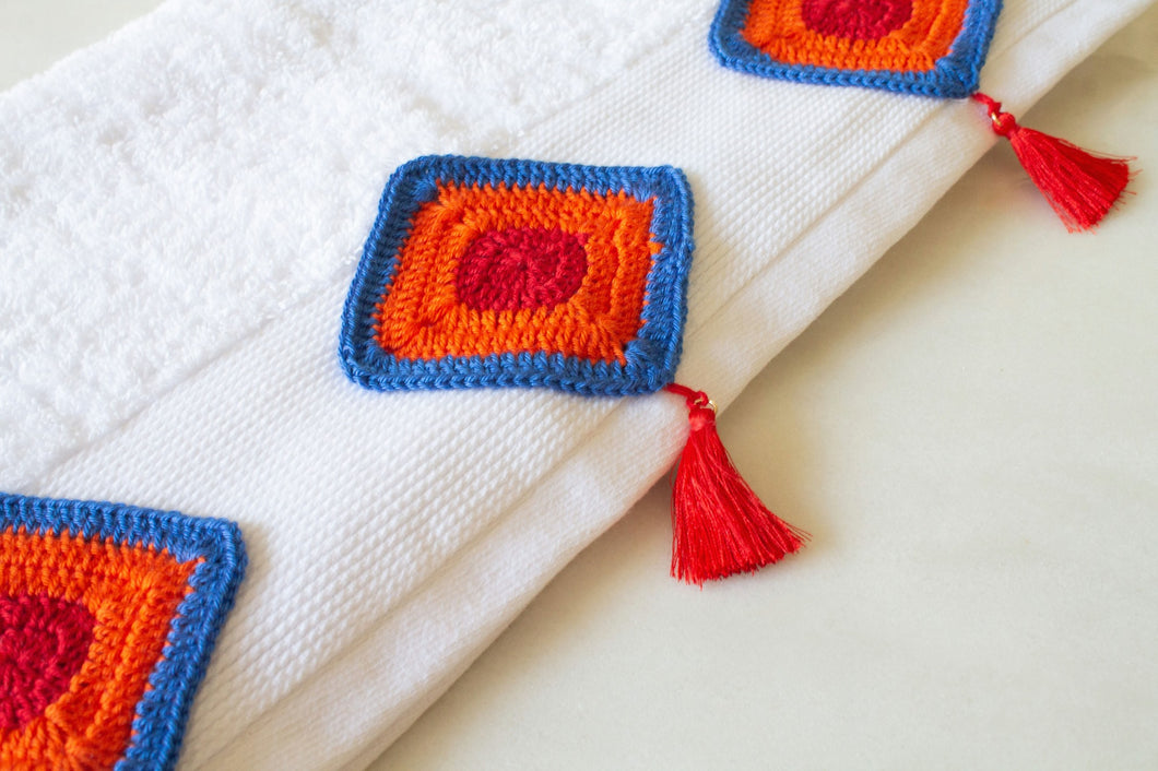 Boho Bliss: white Towel adorned with Handmade Crochet SQUARE and Stylish ORANGE Tassels